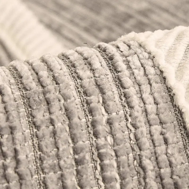zoom sur la housse de canapé en chenille chaleureuse Image